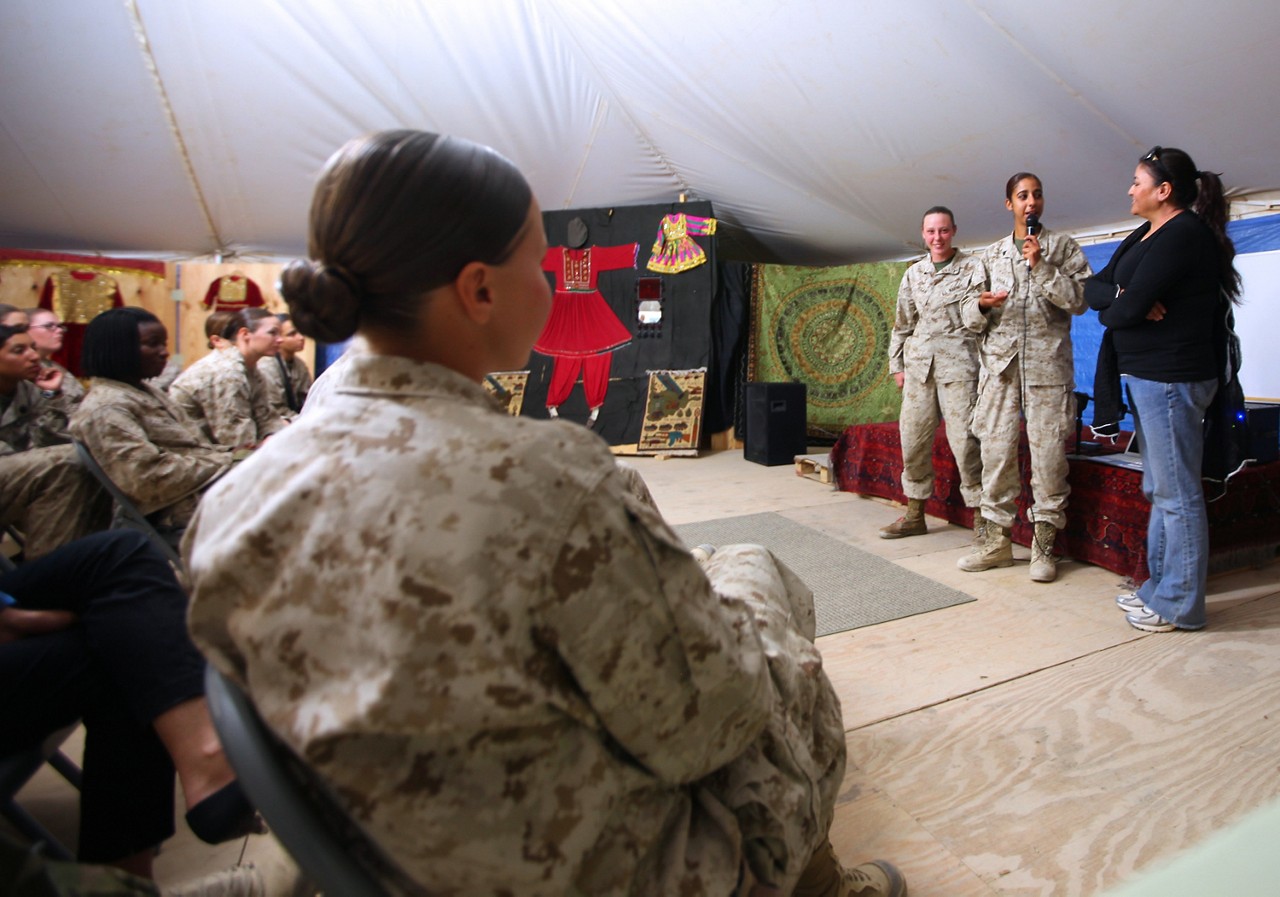 Marines in the linguist MOS field during a presentation.