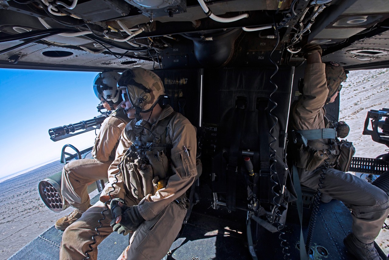 Marines conduct an offensive air support exercise as part of the flight crew.