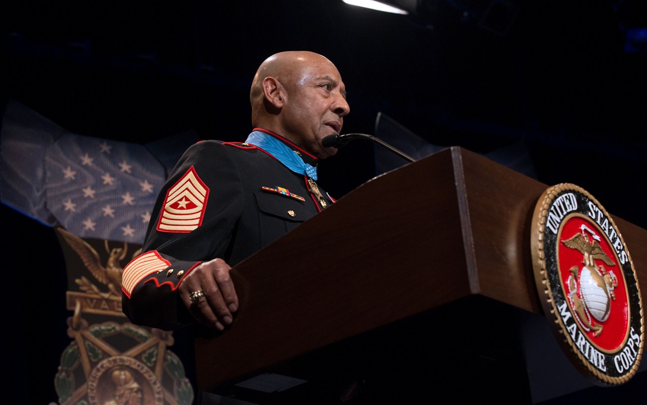 Sergeant Major John Canley speaking at event.