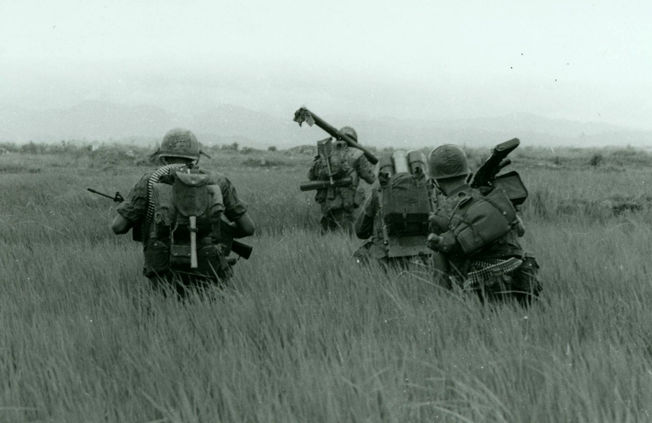 Marines in a field during the Battle of Hue.