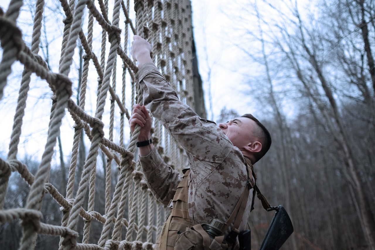 Marine climbing ropes course during training