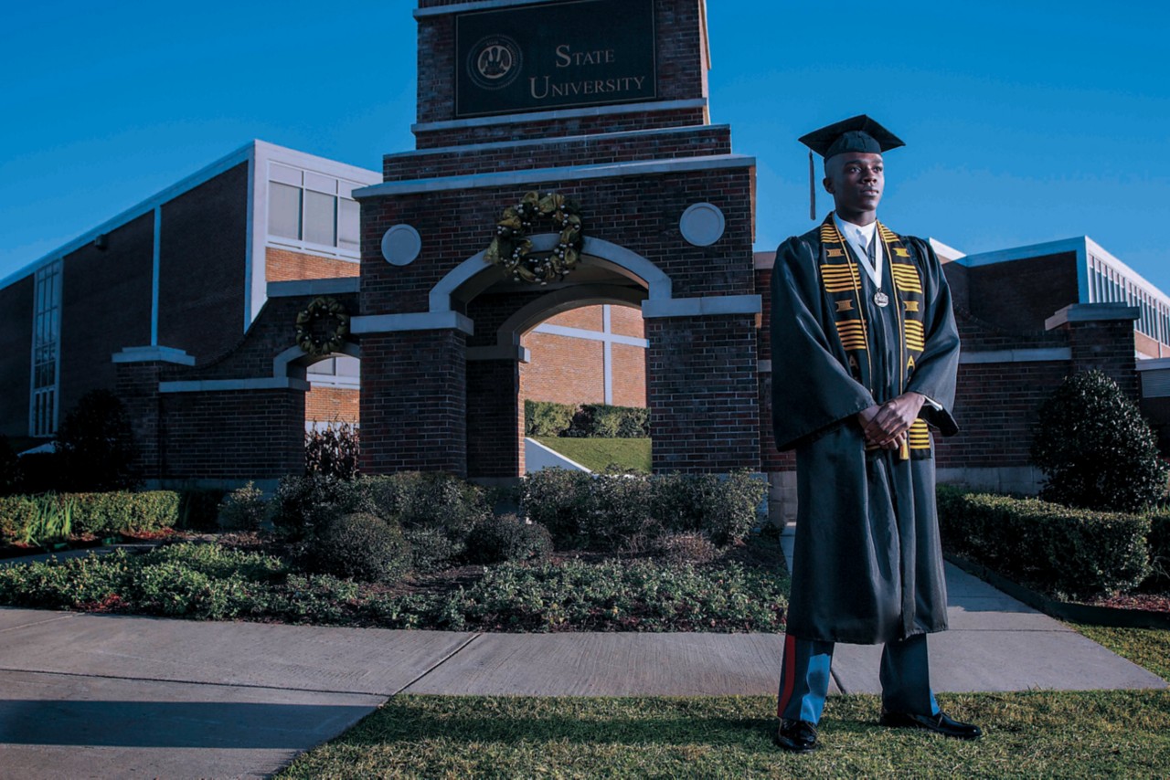 Olaolu Ogunyemi proudly wears his Grambling State University cap and gown before his graduation ceremony Dec. 14, 2012. Upon graduation, Ogunyemi will begin his career as the Marine Corps’ most recently commissioned officer.  Ogunyemi, who is the first Marine officer commissioned from Grambling State University in more than three decades, joins a distinguished heritage of African-American officers started by Frederick C. Branch, the Corps’ first Black officer.    