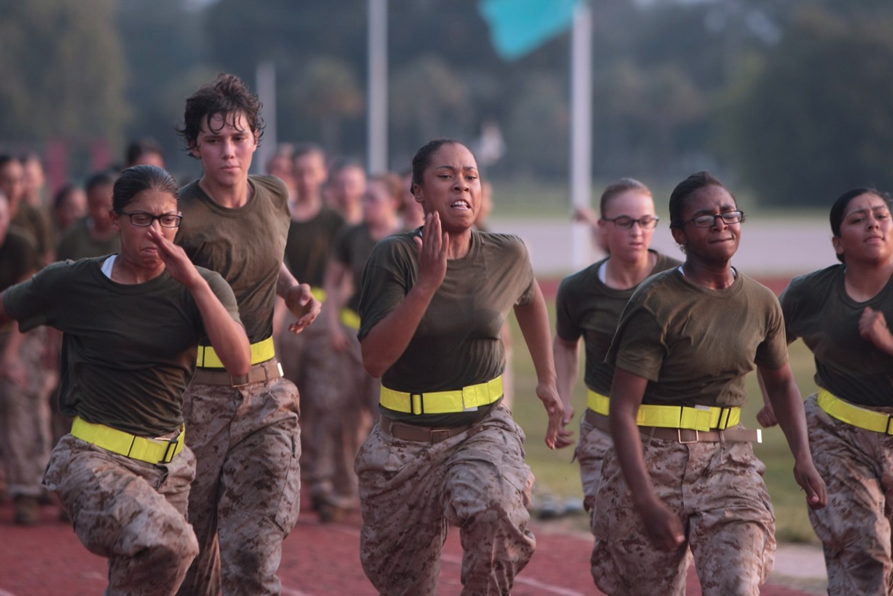 Aspiring Marines running on a track.