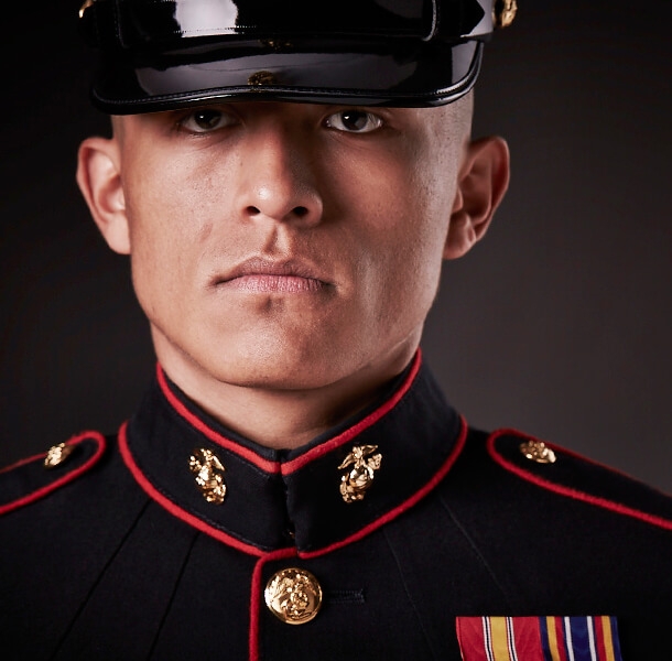 Marine Corps Uniforms Ranks Symbols Marines A Marine In Dress Blues Wears The Eagle Globe And Anchor Emblem